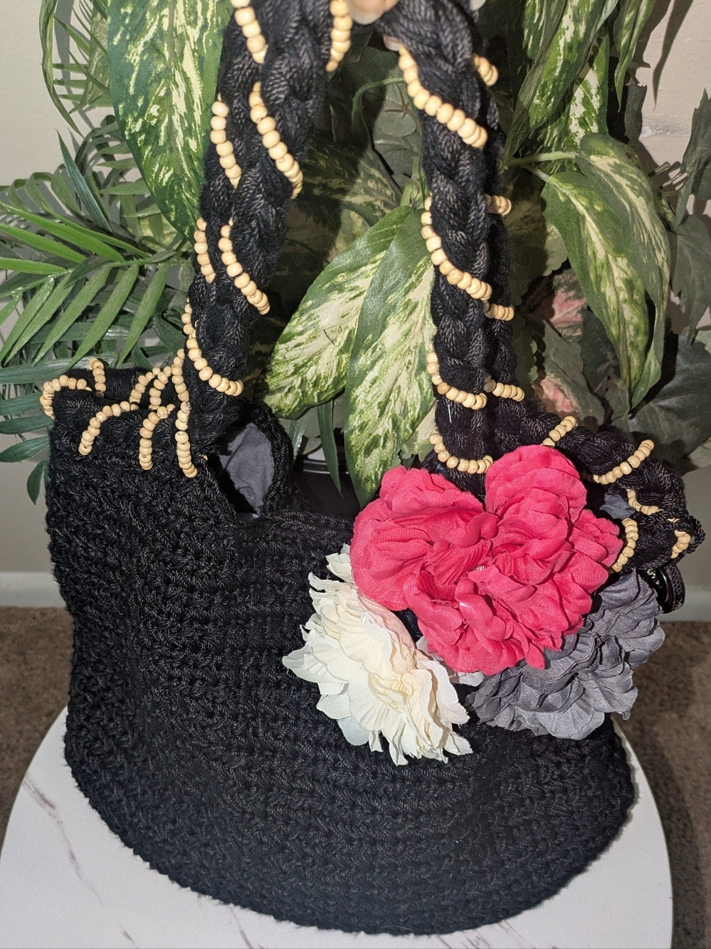 The Sak Black Crochet Tote Bag with Floral Accents